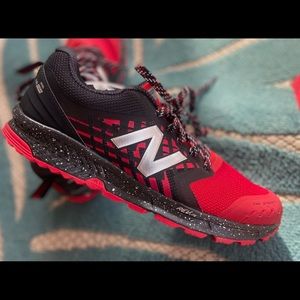 “Brand New”New Balance Fuel core Nitrel All Terrain Black & Red, Size 10